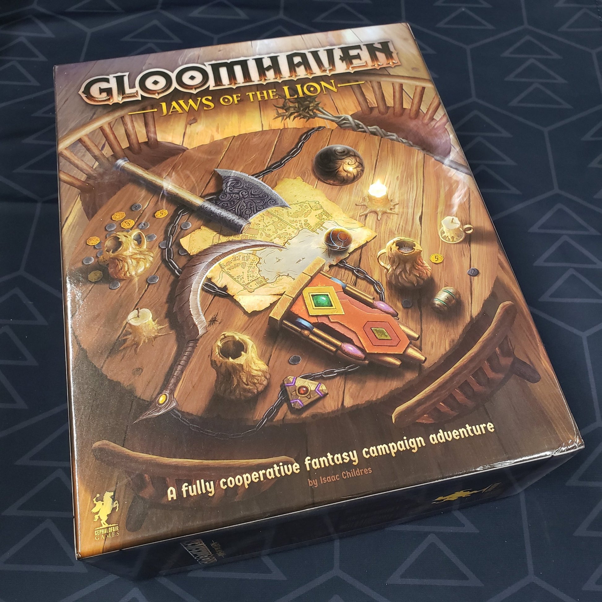 Image shows the front cover of the box of the Gloomhaven: Jaws of the Lion board game