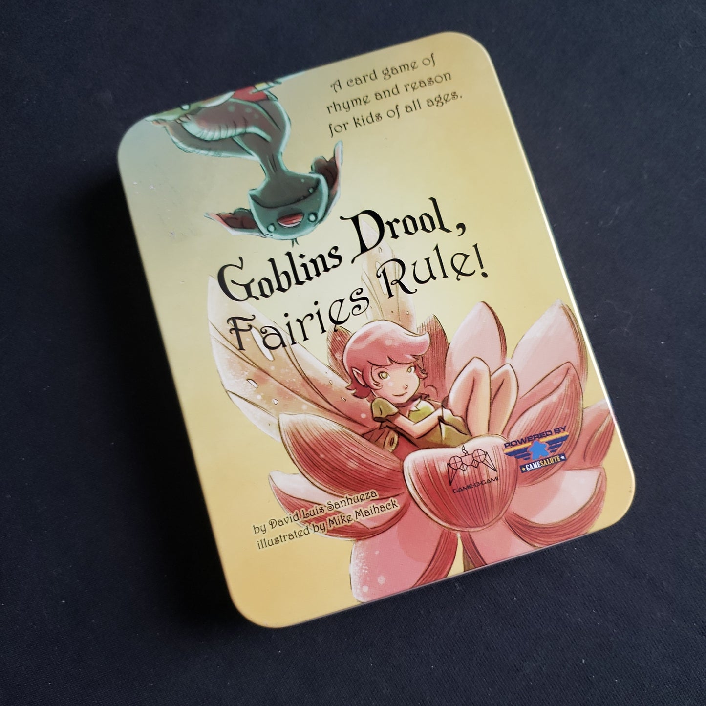 Image shows the front cover of the box of the Goblins Drool, Fairies Rule! card game