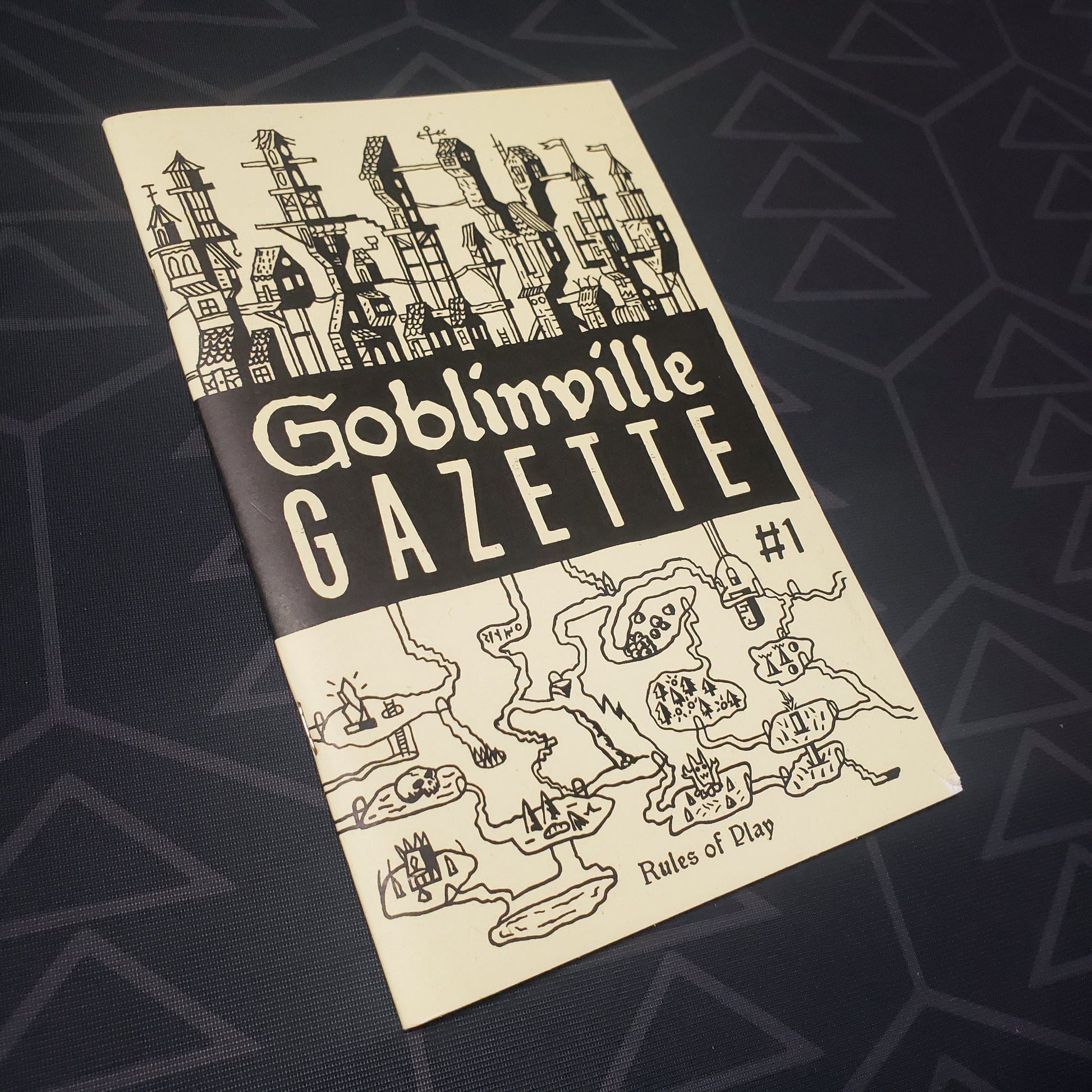 Image shows the front cover of the Goblinville Gazette #1: Rules of Play roleplaying game book