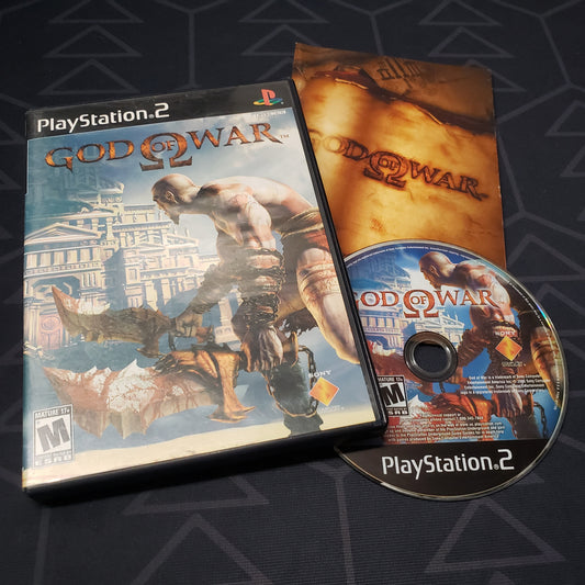 Image shows the case, manual and disc for the video game God of War for Playstation 2