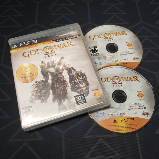 Image shows the case and two discs for the video game collection God of War Saga for Playstation 3