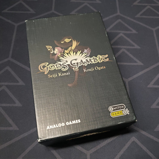Image shows the front cover of the box for the Gods' Gambit card game