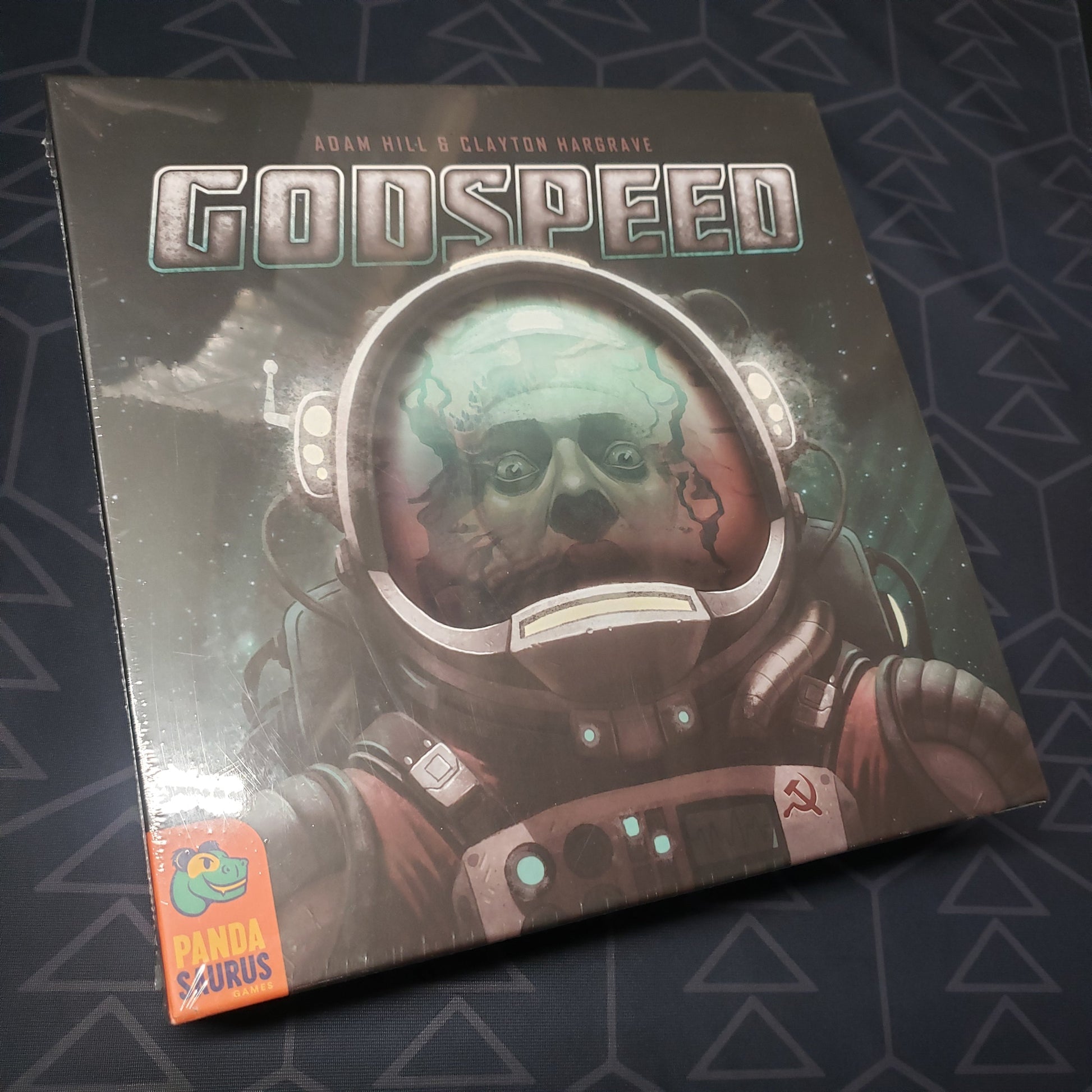 Image shows the front cover of the box for the Godspeed board game