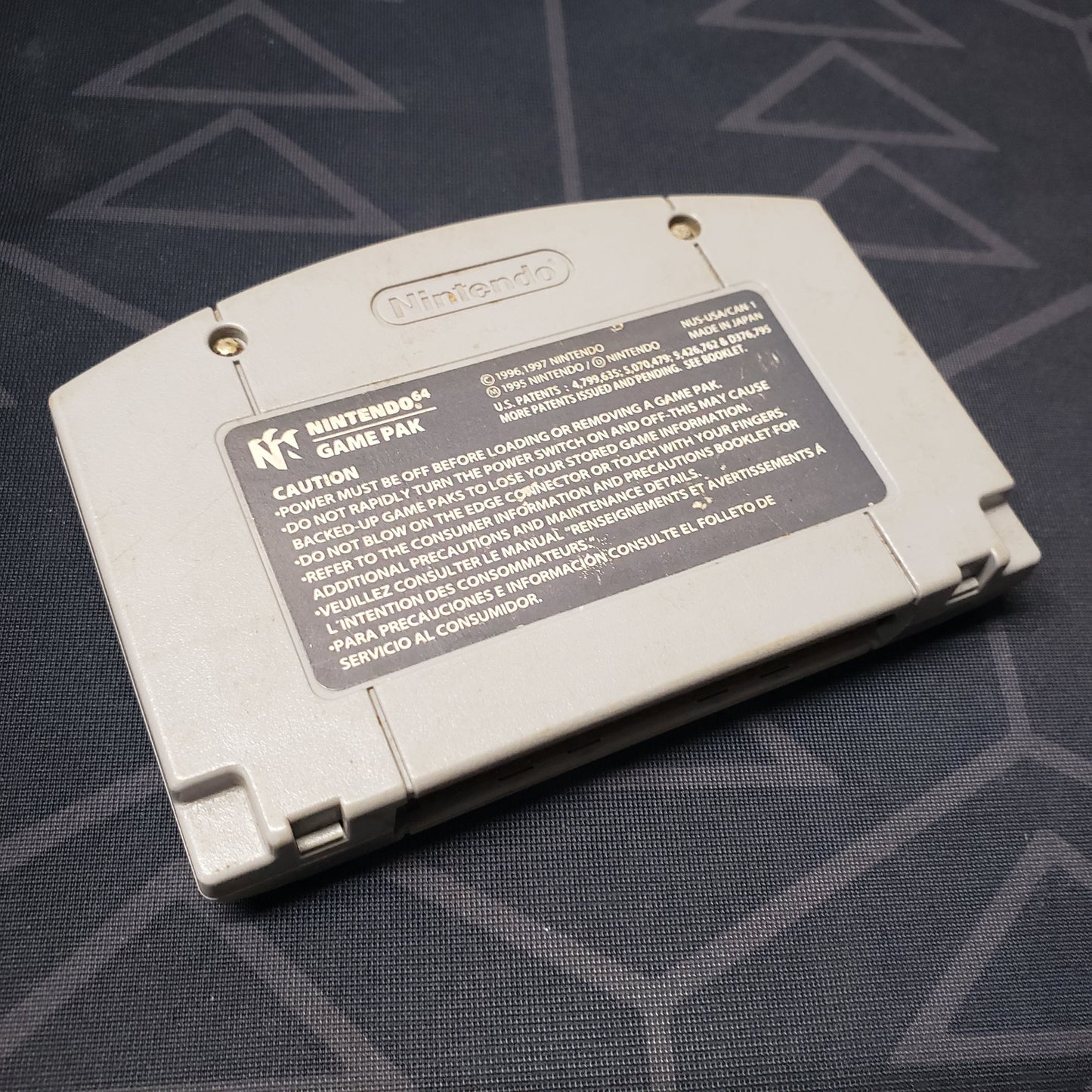 Image shows the back of the cartridge for the video game Goldeneye 007 for the Nintendo 64