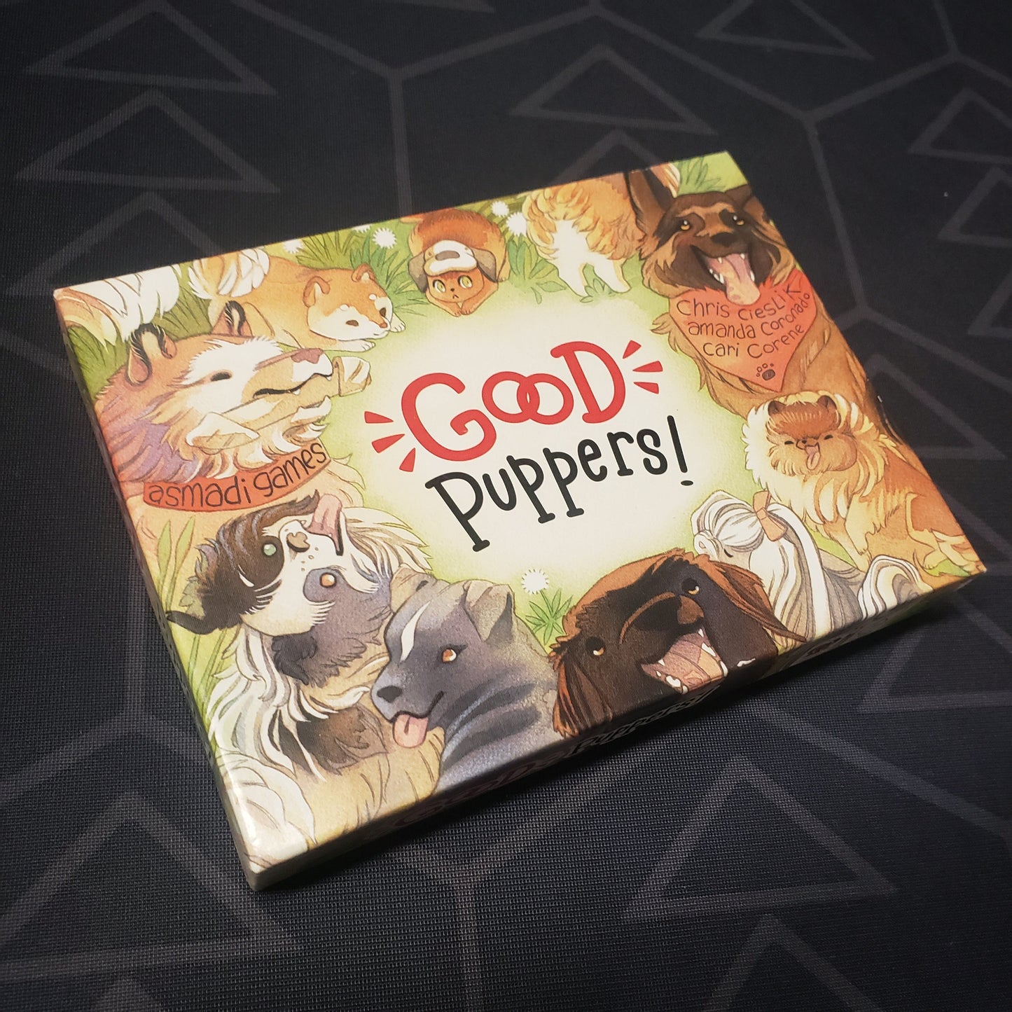 Image shows the front cover of the box for the Good Puppers! card game