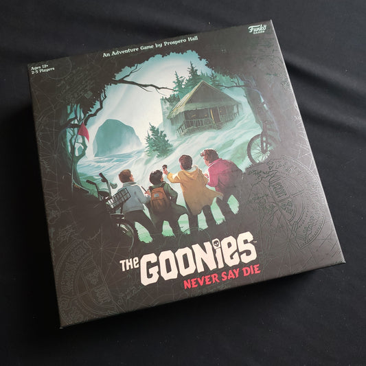 Image shows the front cover of the box of the Goonies: Never Say Die board game