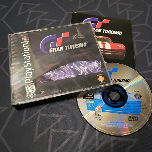 Image shows the jewel case, manual and disc for the video game Gran Turismo for Playstation 1