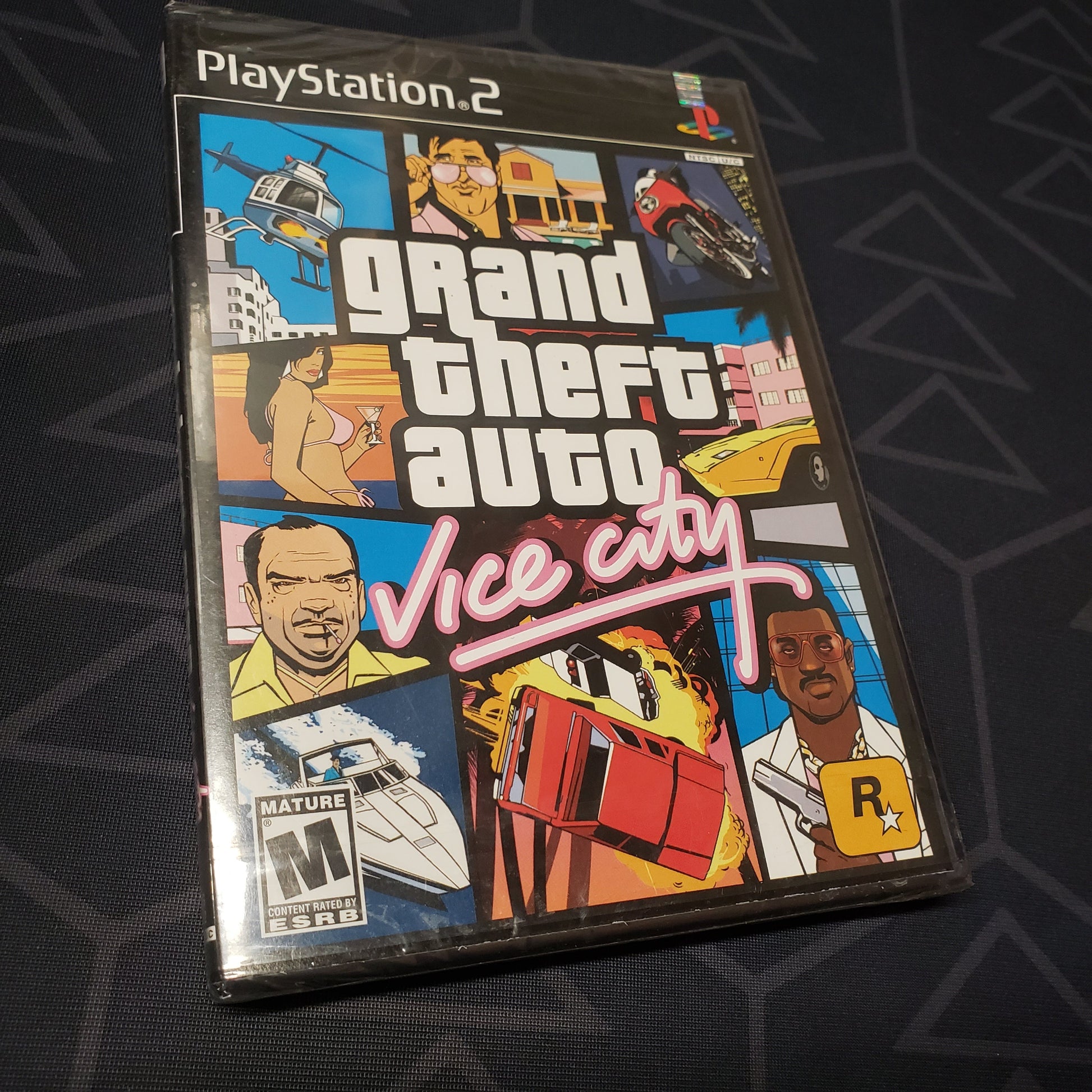 Image shows the front of the case for the video game Grand Theft Auto: Vice City for Playstation 2