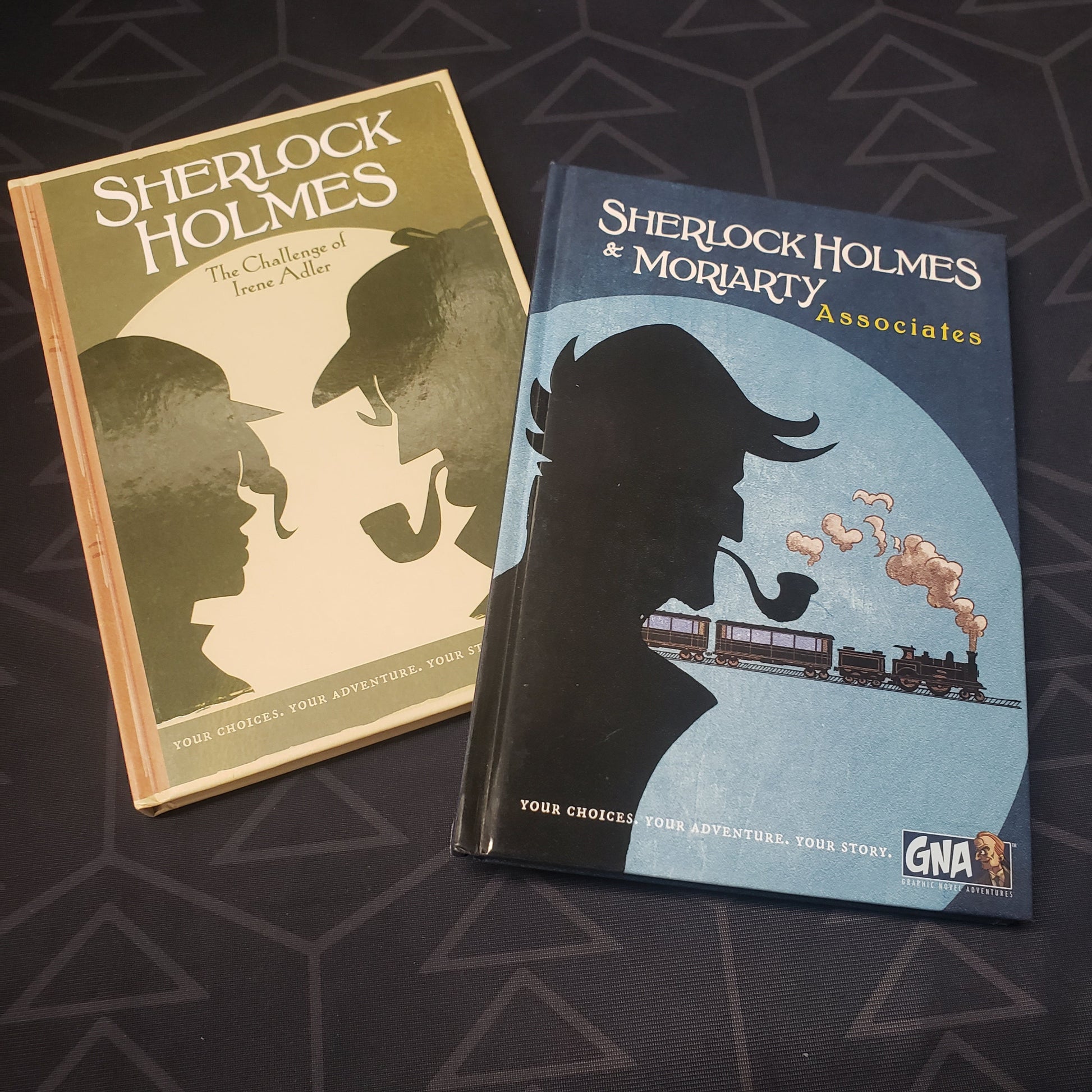 Image shows the covers of two of the books in the Graphic Novel Adventures: Season 2 gaming book box set