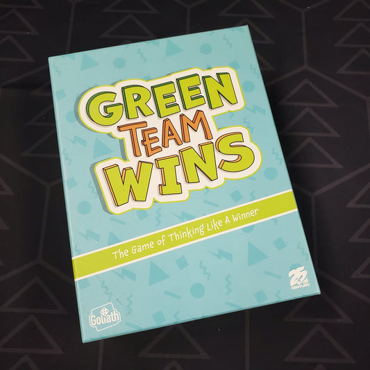 Image shows the front cover of the box of the Green Team Wins party game