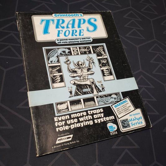 Image shows the front cover of the Grimtooth's Traps Fore roleplaying game book