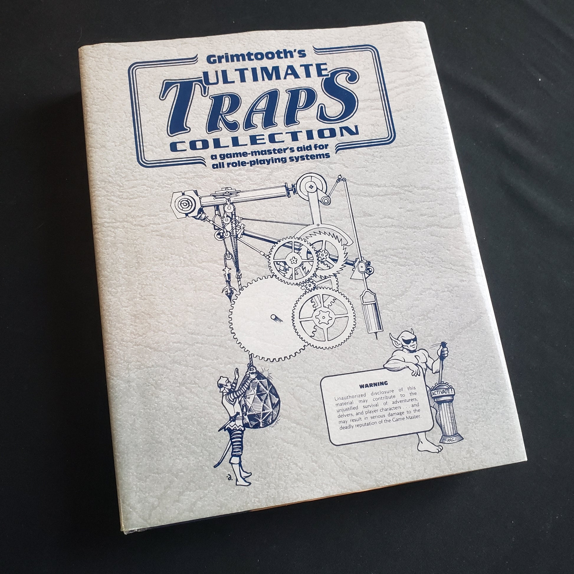 Image shows the front cover of the Grimtooth's Ultimate Traps Collection roleplaying game book