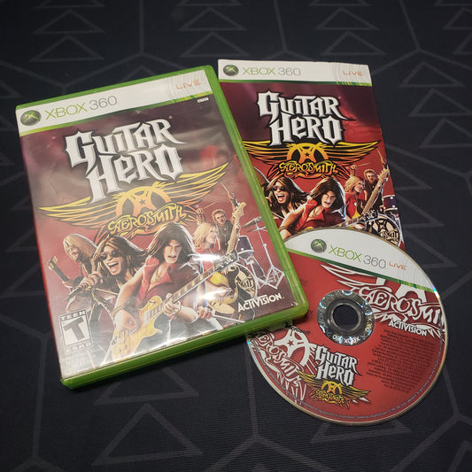 Image shows the case, manual and disc for the video game Guitar Hero: Aerosmith for Xbox 360