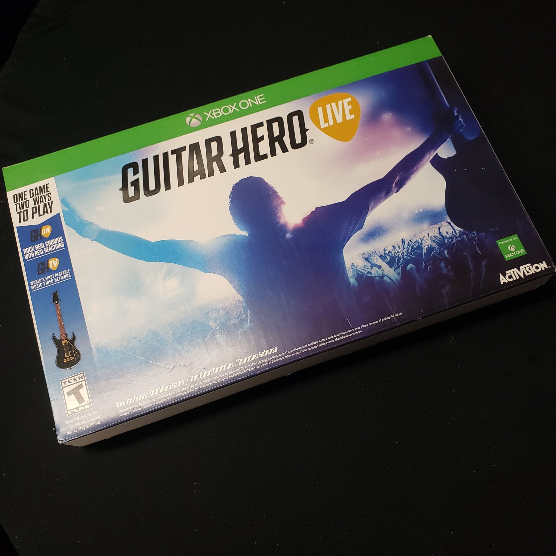 Image shows the front of the guitar bundle box for the video game Guitar Hero Live for Xbox One