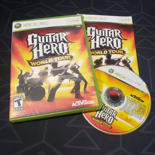 Image shows the case, manual and disc for the video game Guitar Hero: World Tour for Xbox 360