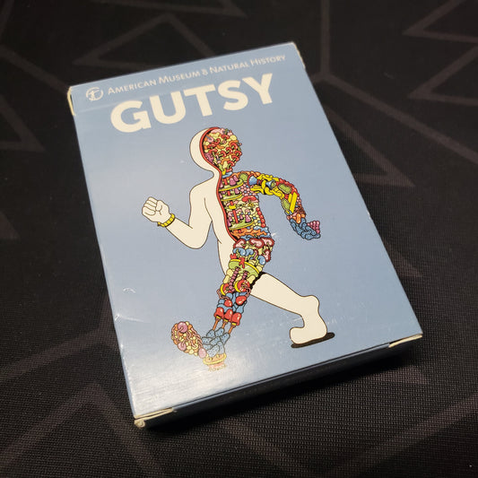 Image shows the front cover of the box for the Gutsy card game