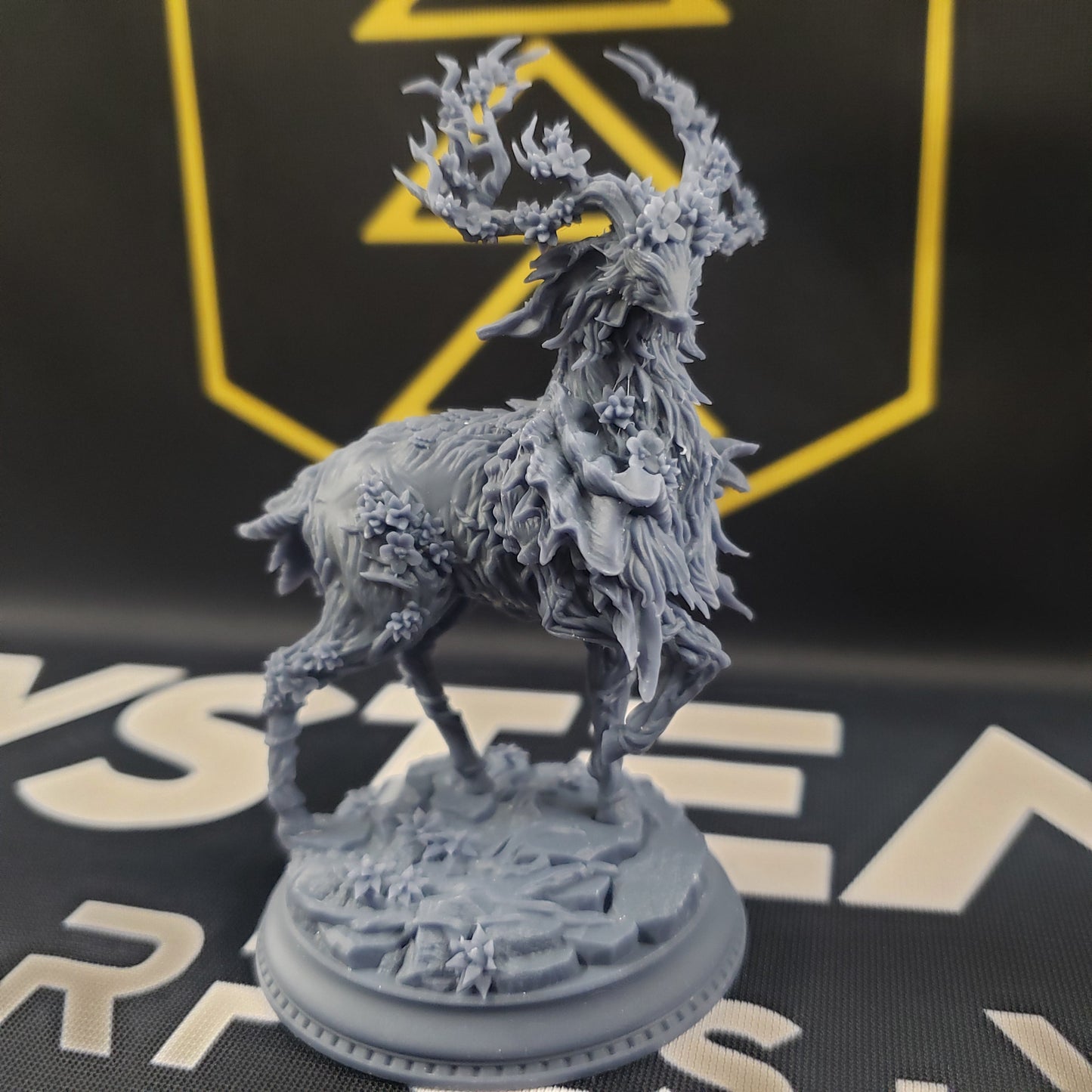 Image shows the front of a fey deer gaming miniature.