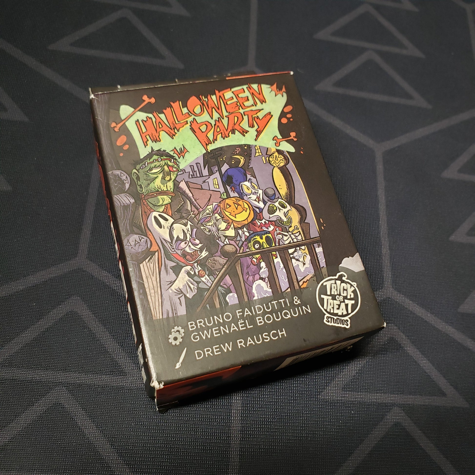 Image shows the front cover of the box for the Halloween Party card game