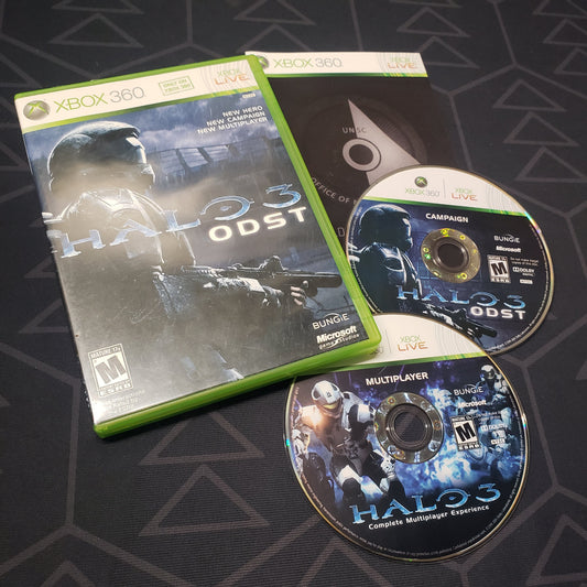 Image shows the case, manual and two discs for the video game Halo 3: ODST for Xbox 360