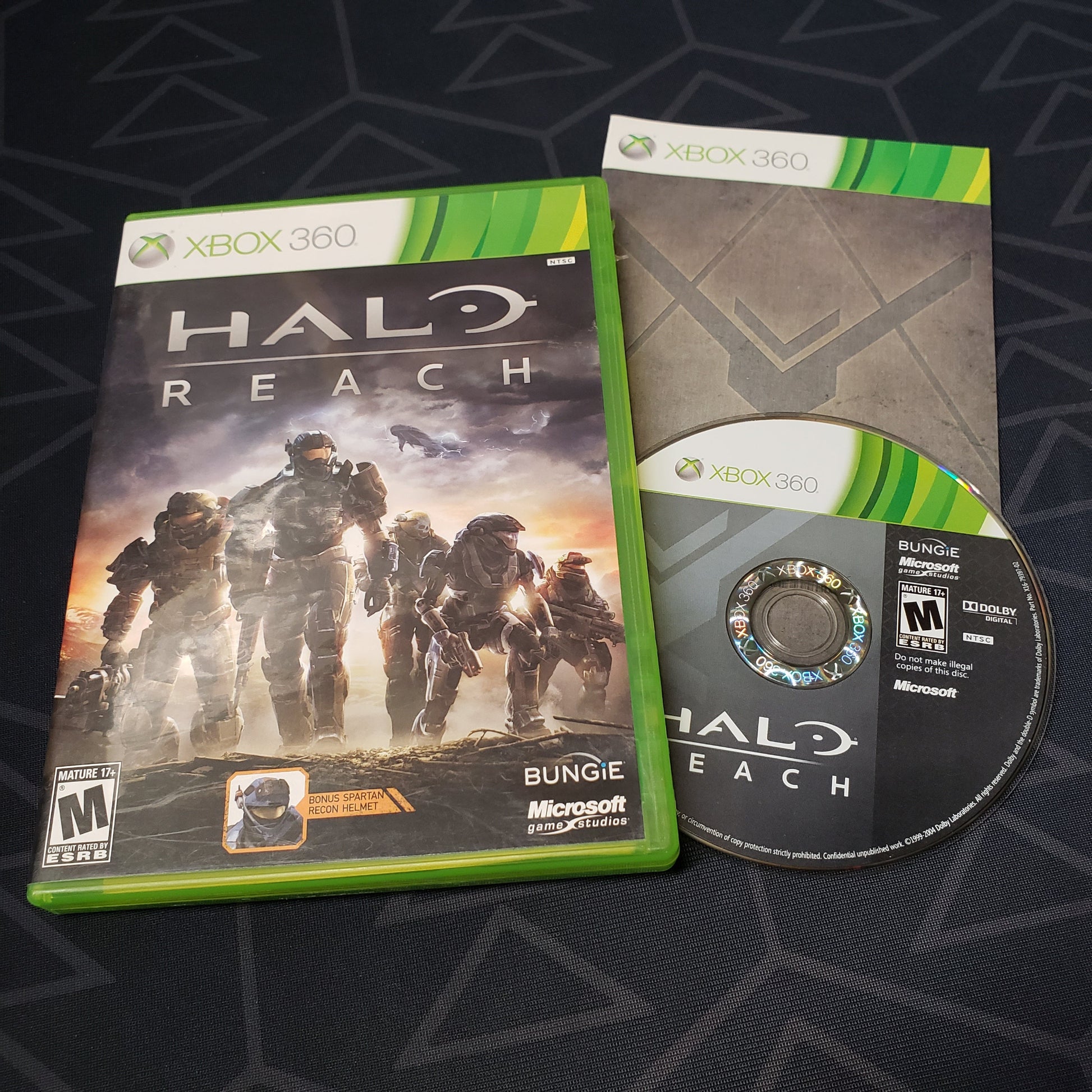 Image shows the case, manual and disc for the video game Halo Reach for Xbox 360