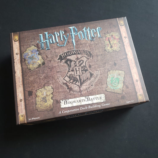 Image shows the front cover of the box of the Harry Potter: Hogwarts Battle board game