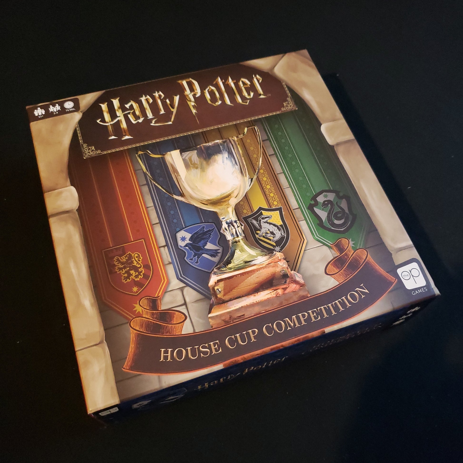 Image shows the front cover of the box of the Harry Potter: House Cup Competition board game