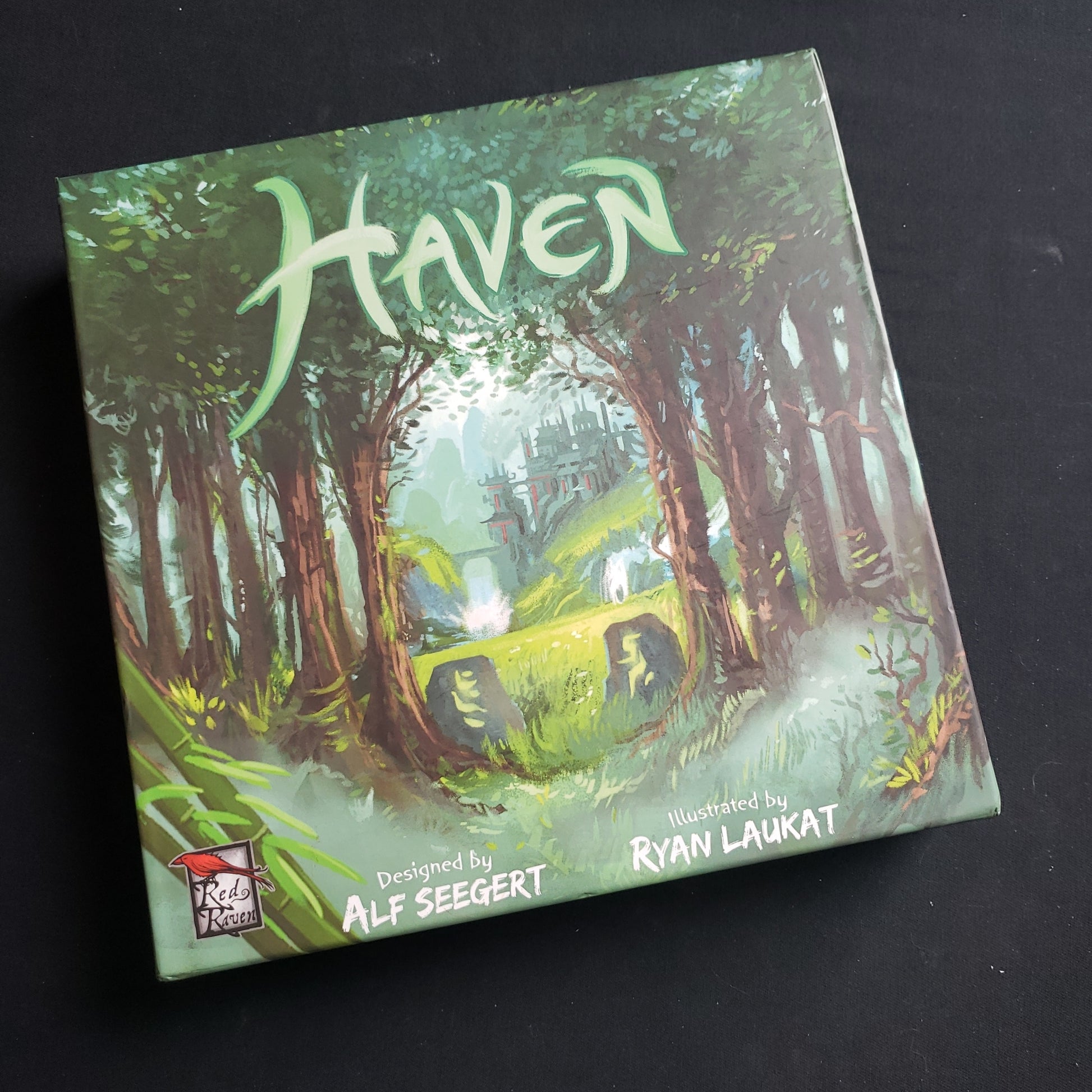 Image shows the front cover of the box of the Haven board game