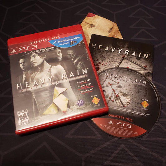 Image shows the case, manual and disc for the video game Heavy Rain: Director's Cut for Playstation 3