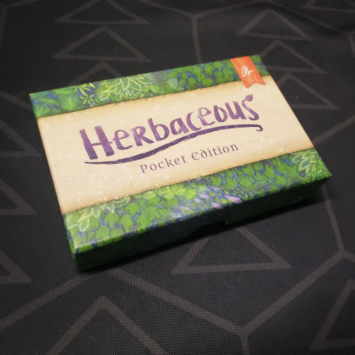 Image shows the front cover of the box for the Herbaceous: Pocket Edition card game