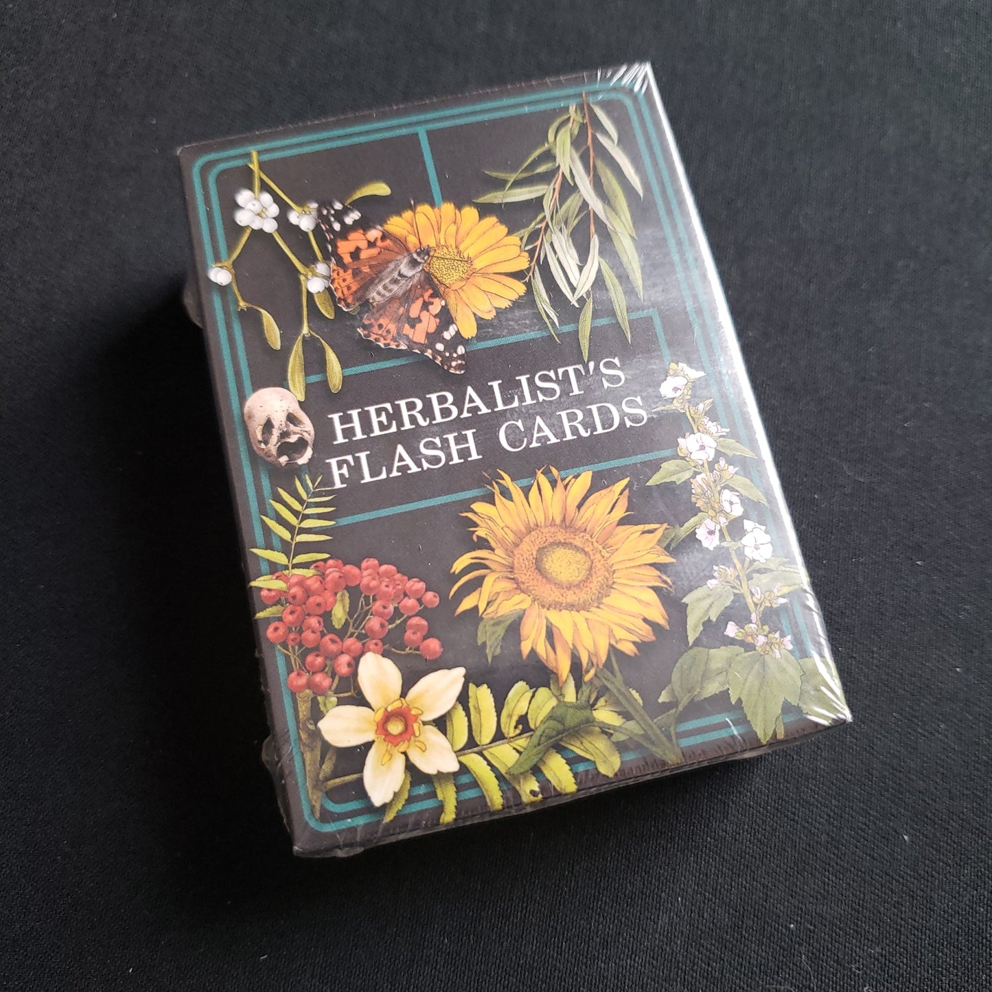 Image shows the front of the box of the Herbalist's Flash Cards roleplaying game accessory