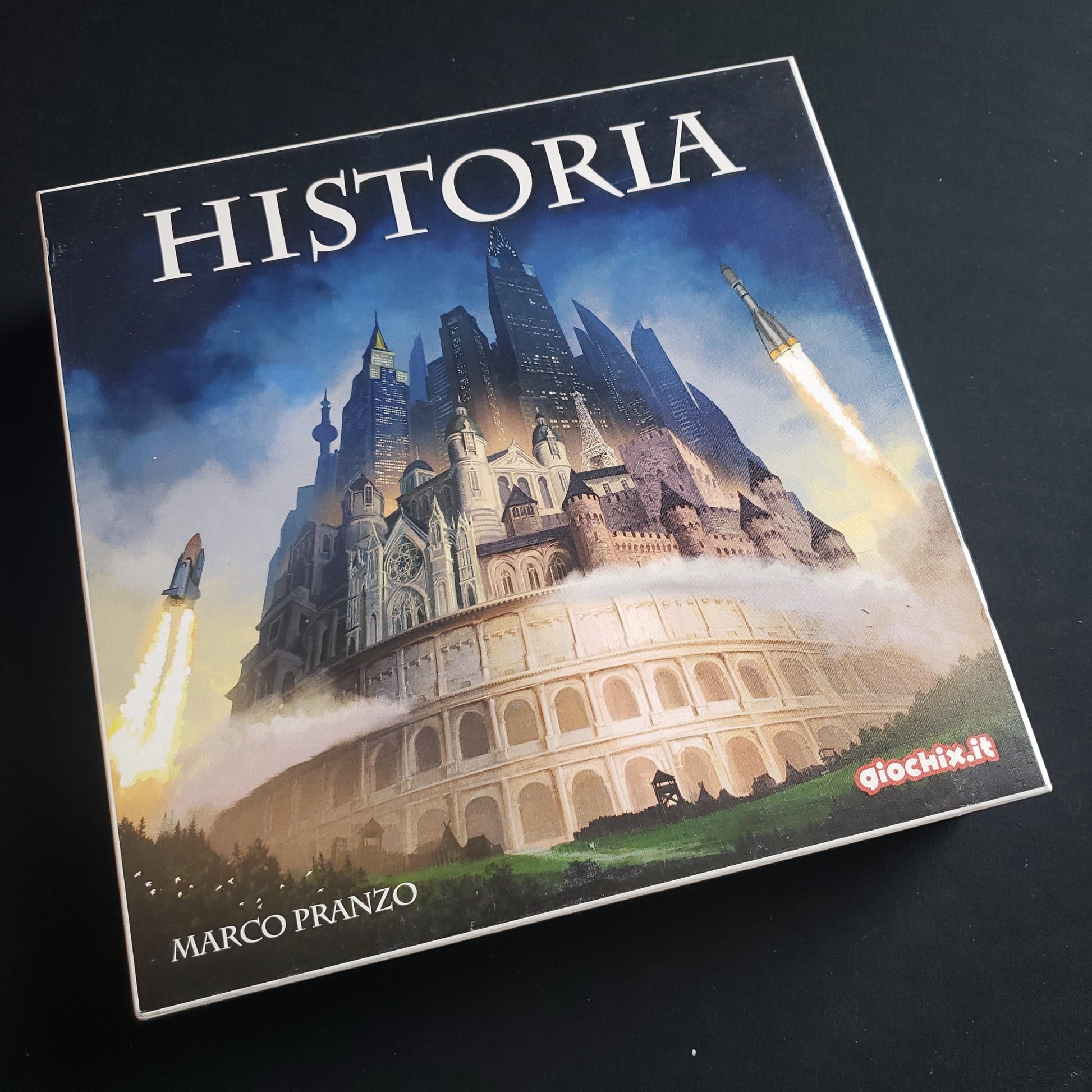 Image shows the front cover of the box of the Historia board game