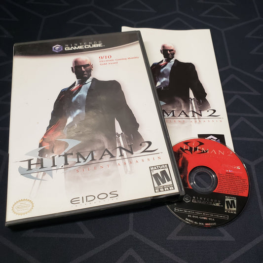 Image shows the case, manual and disc for the video game Hitman 2: Silent Assassin for Nintendo GameCube