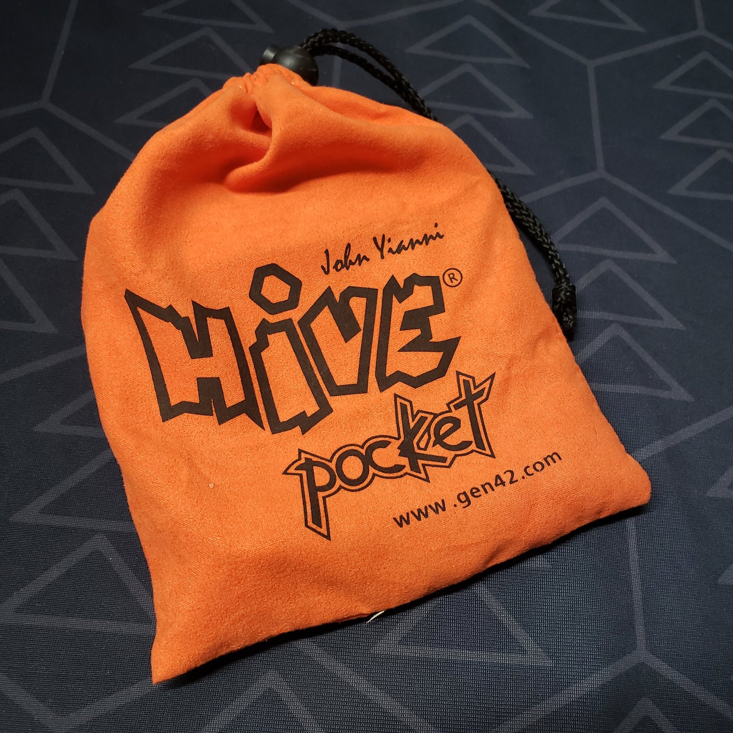 Image shows the front of the bag for the Hive Pocket board game