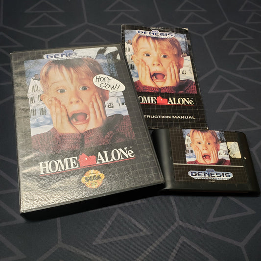 Image shows the case, manual and cartridge for the video game Home Alone for Sega Genesis