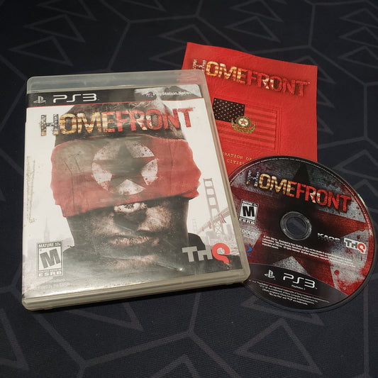 Image shows the case, manual and disc for the video game Homefront for Playstation 3