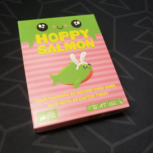 Image shows the front cover of the box for the Hoppy Salmon card game