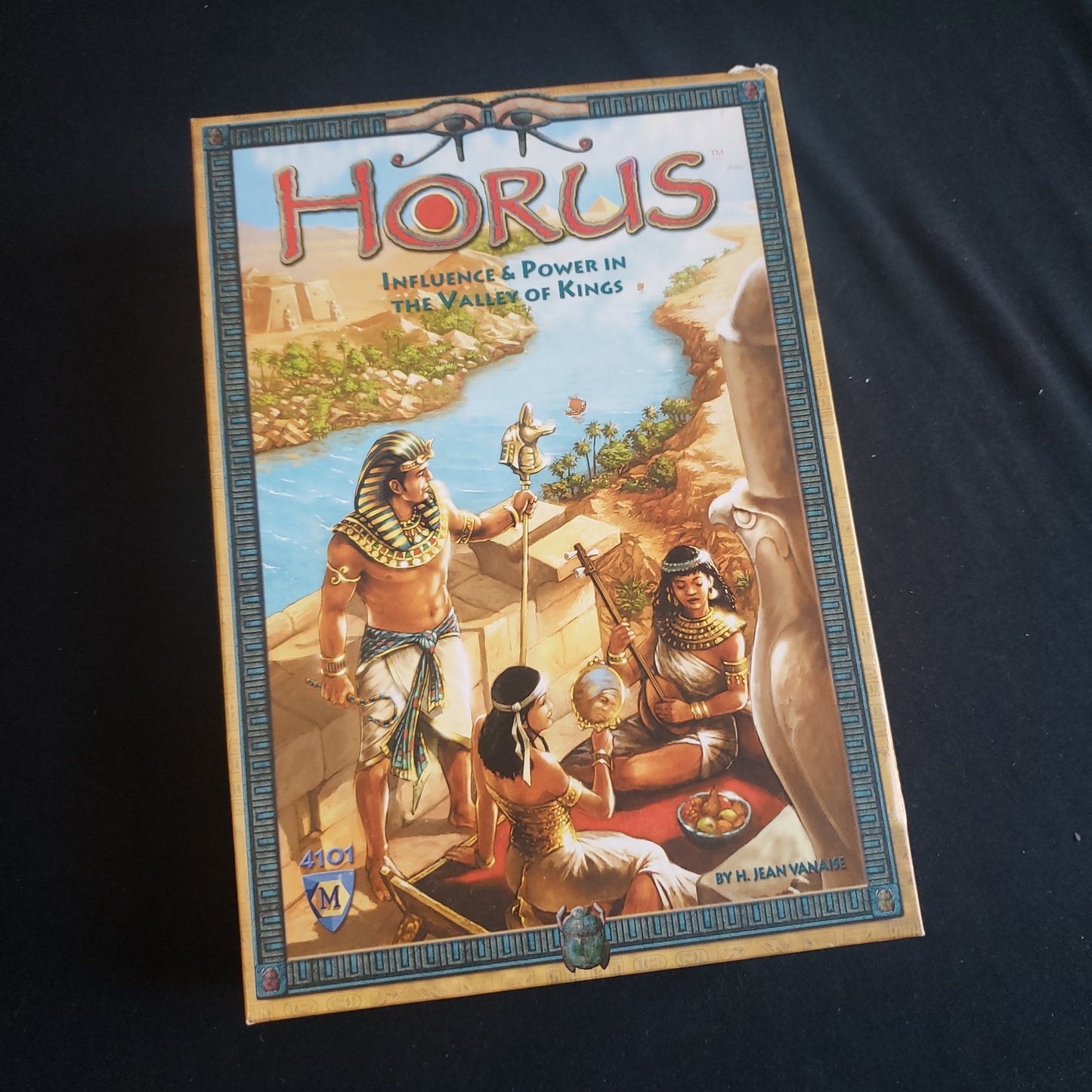 Image shows the front cover of the box of the Horus board game