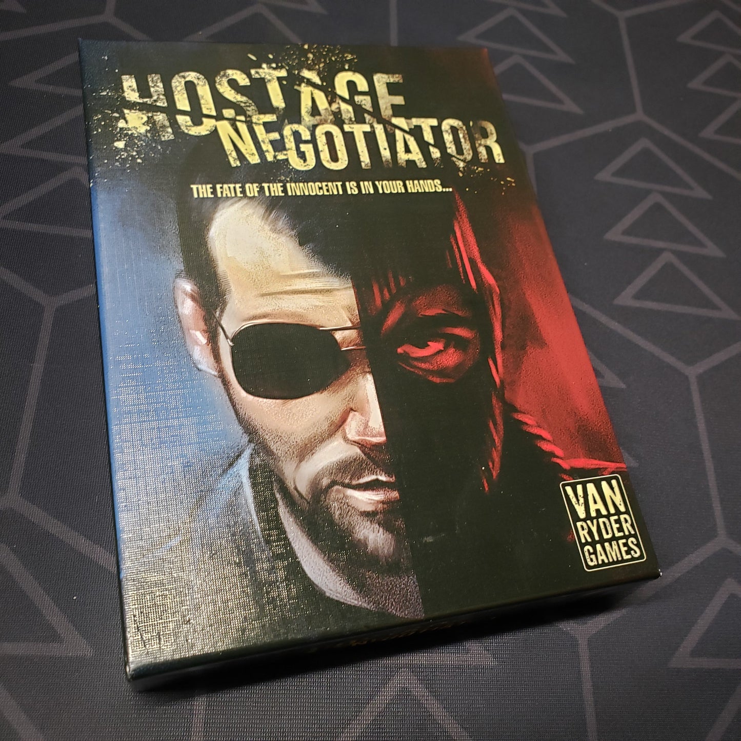 Image shows the front cover of the box for the Hostage Negotiator board game