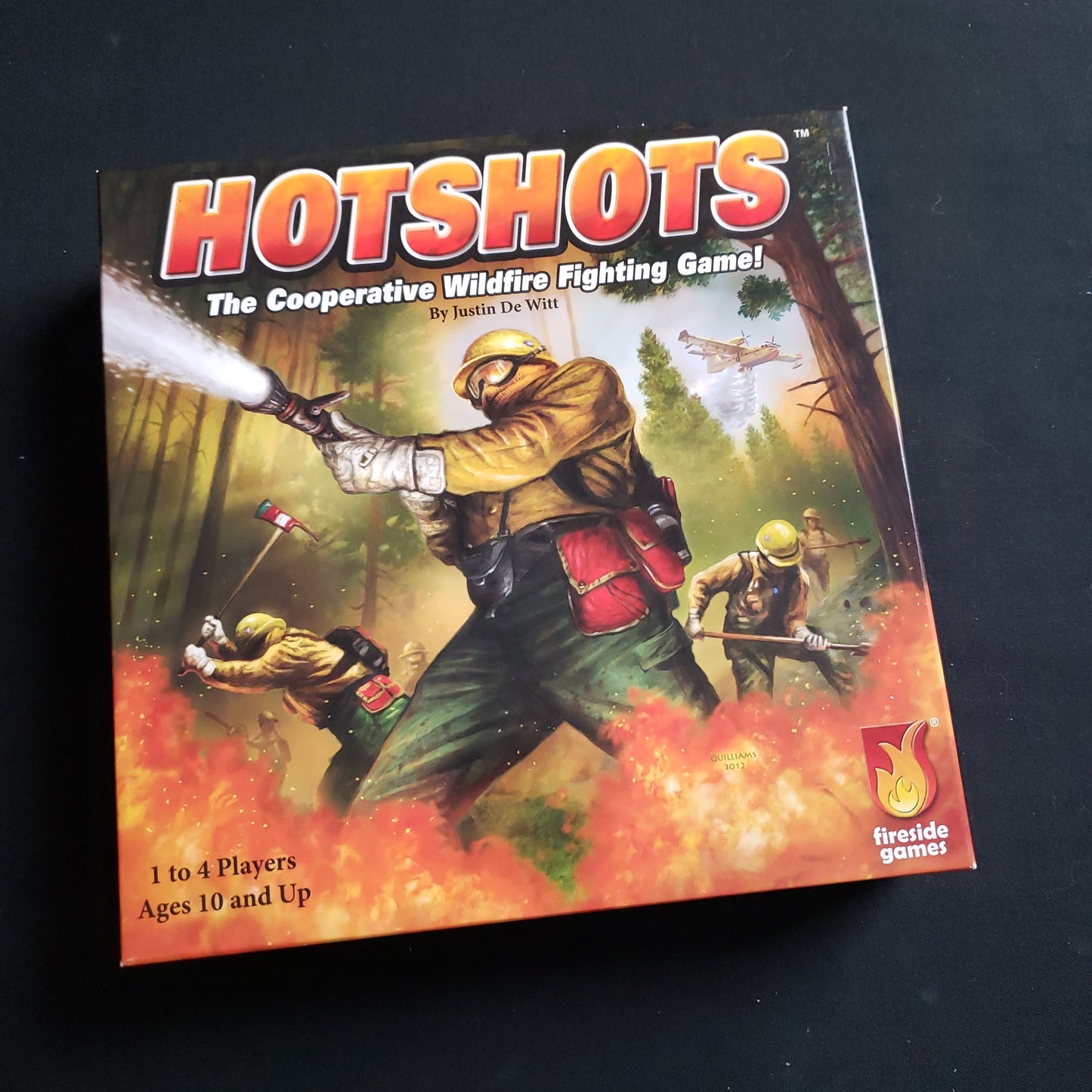 Image shows the front cover of the box of the Hotshots board game