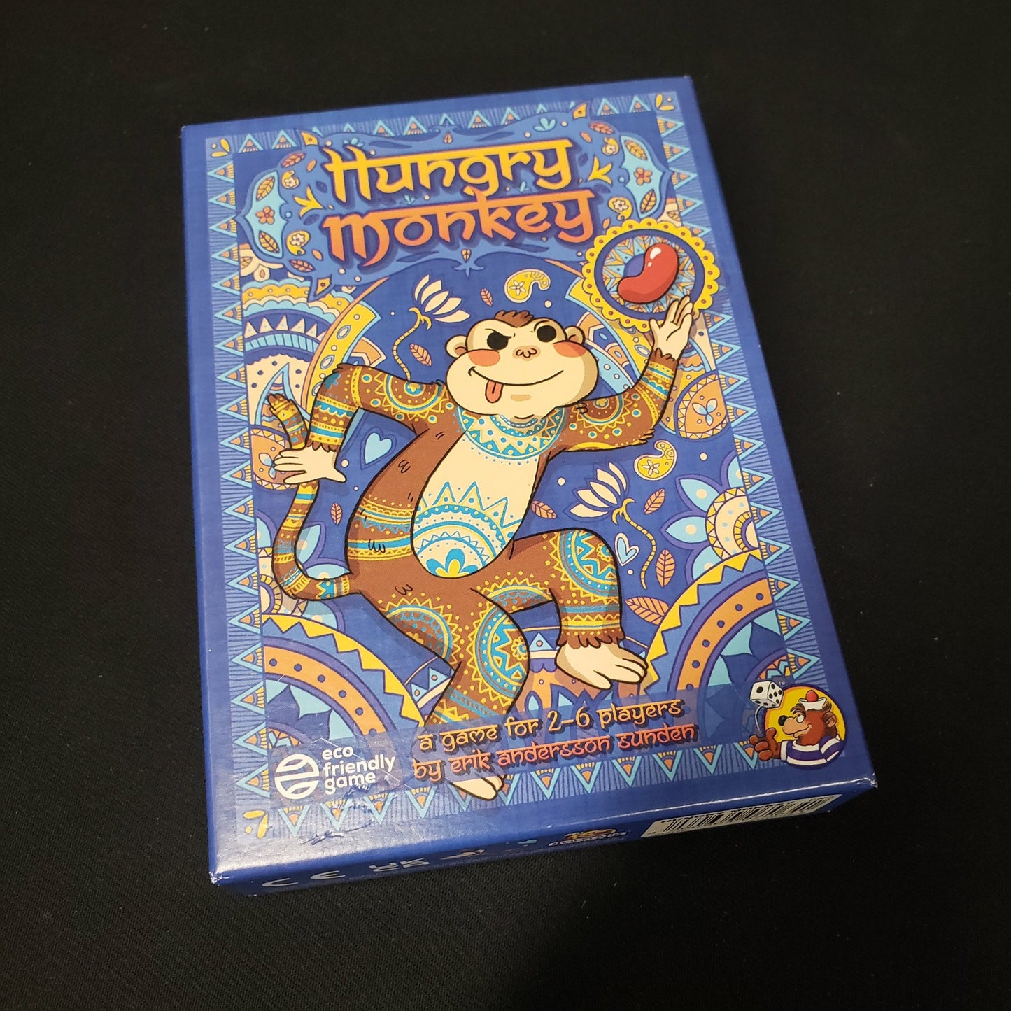 Image shows the front cover of the box of the Hungry Monkey card game