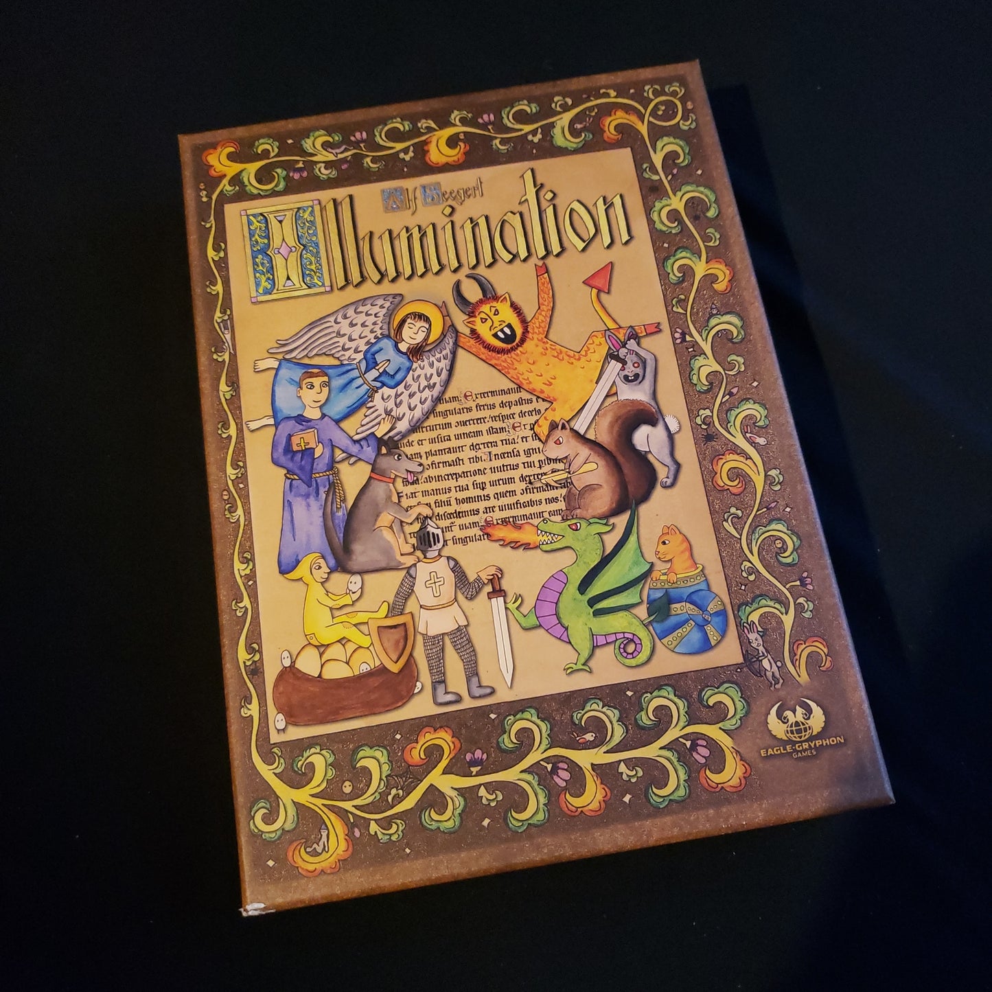 Image shows the front cover of the box of the Illumination board game