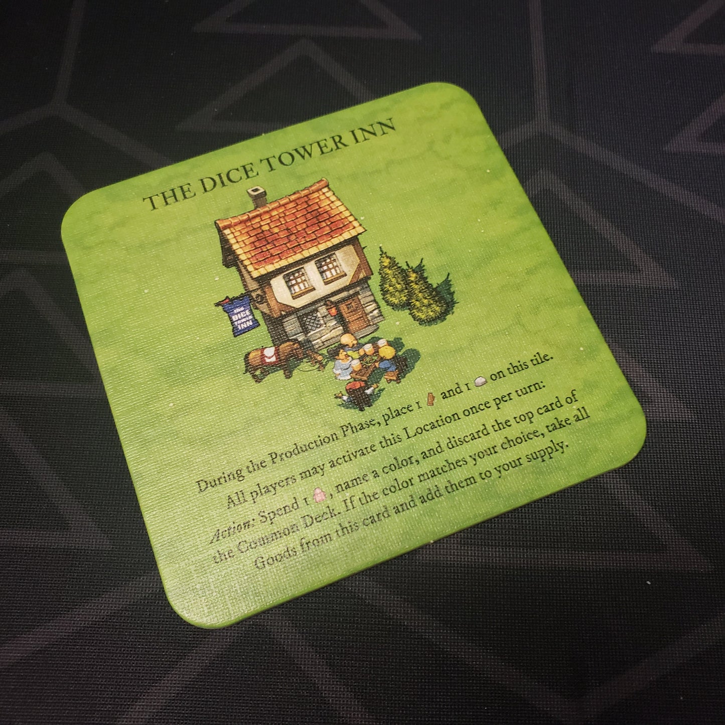 Image shows the Dice Tower Inn promo tile expansion for the card game Imperial Settlers