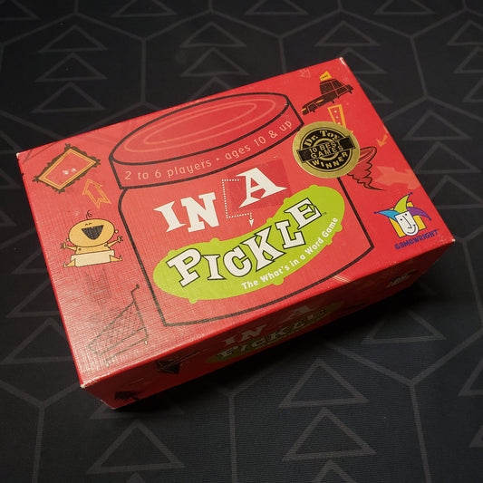 Image shows the front cover of the box for the In a Pickle card game