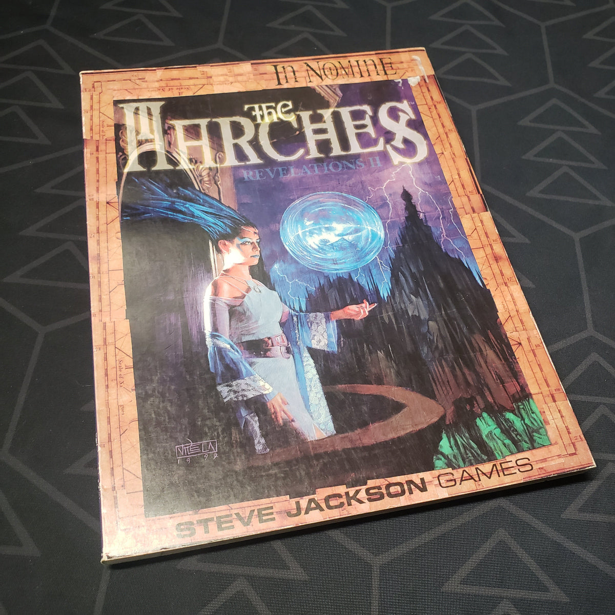 Image shows the front cover of the Revelations II: The Marches book for the roleplaying game In Nomine