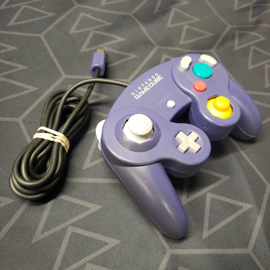 Image shows an Indigo color gaming controller for the GameCube