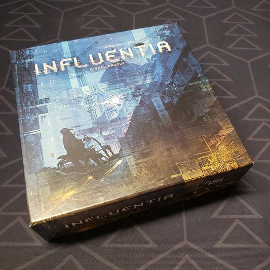 Image shows the front cover of the box for the Influentia card game