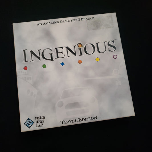 Image shows the front cover of the box of the Travel Edition of the board game Ingenious