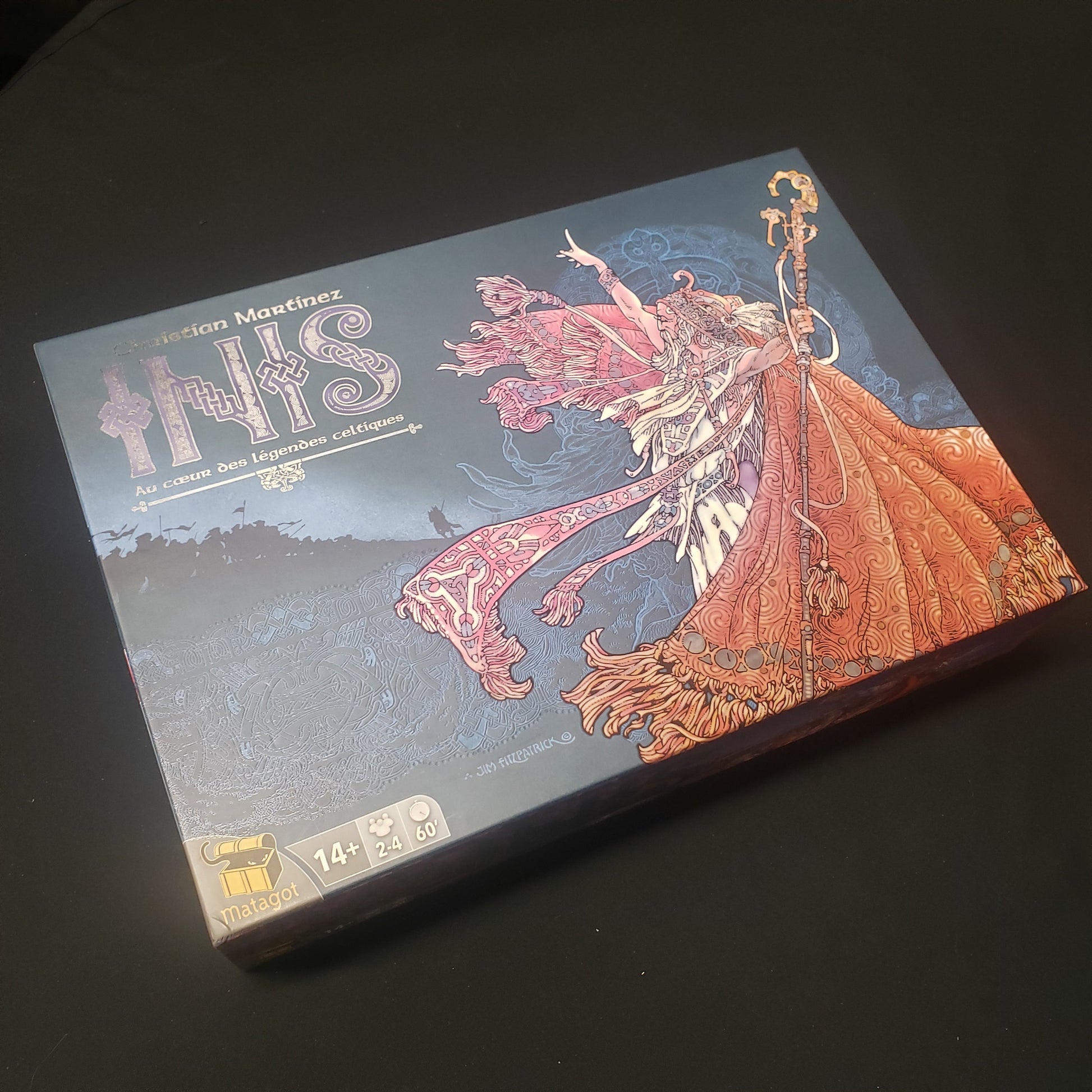 Image shows the front cover of the box for the Inis board game