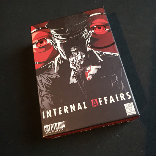 Image shows the front cover of the box of the Internal Affairs card game