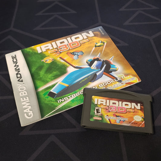 Image shows the manual & cartridge for the video game Iridion 3D for Nintendo Game Boy Advance